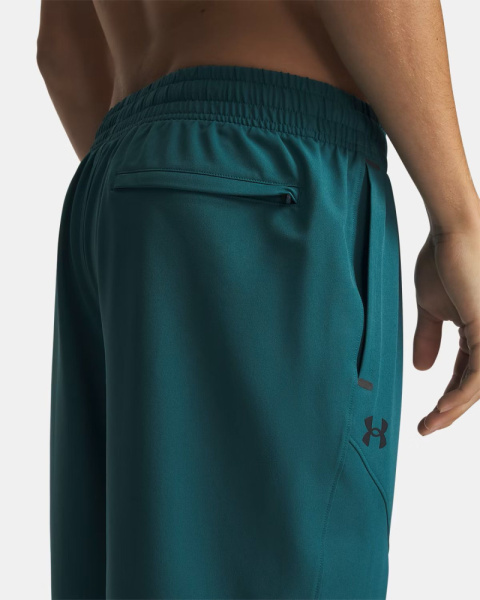 Брюки M Unstoppable Tapered Under Armour, цвет Rack Green 4